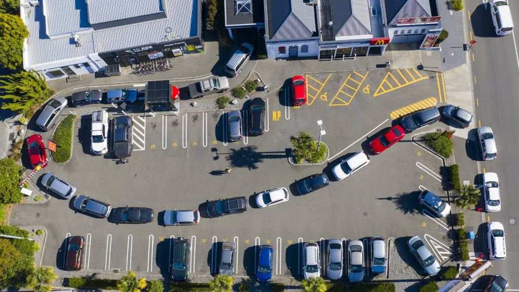 A parking lot with cars parked in it